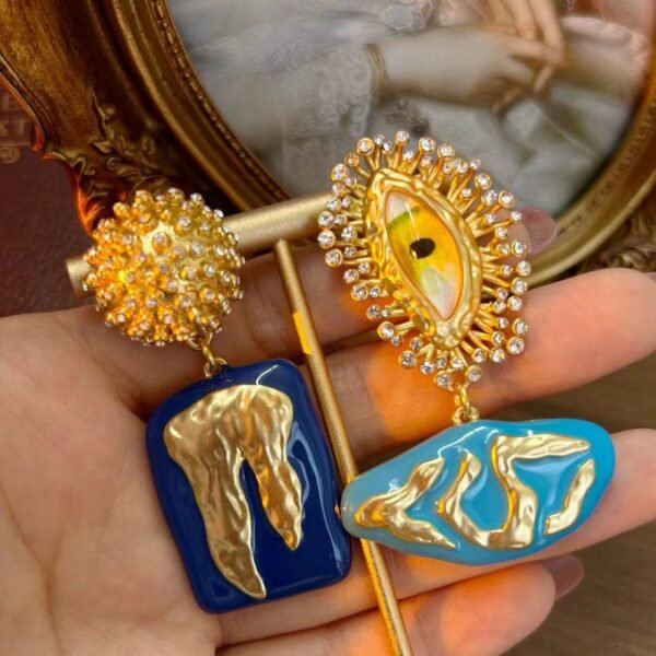 18k Gold Plated Vintage Design Asymethric Eye Rhinestone Inlaid Blue Tooth Dangle Earrings - Image 2