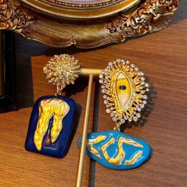 18k Gold Plated Vintage Design Asymethric Eye Rhinestone Inlaid Blue Tooth Dangle Earrings - Image 3
