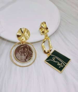 Asymmetrical Earrings With Lines And Human Faces