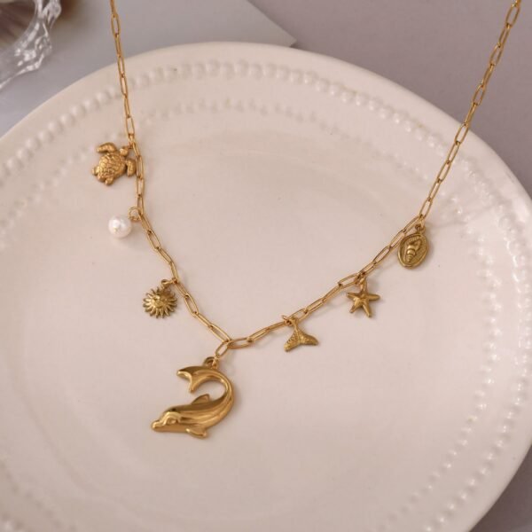 18k Gold Plated Stainless Steel Beach Theme Summer Vibe Charm Necklace with Star Fish Sea Shell Turtle Charms - Image 3