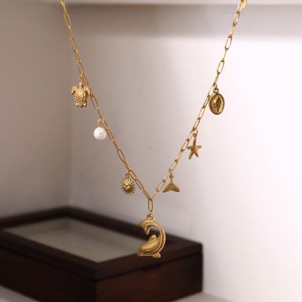 18k Gold Plated Stainless Steel Beach Theme Summer Vibe Charm Necklace with Star Fish Sea Shell Turtle Charms - Image 4